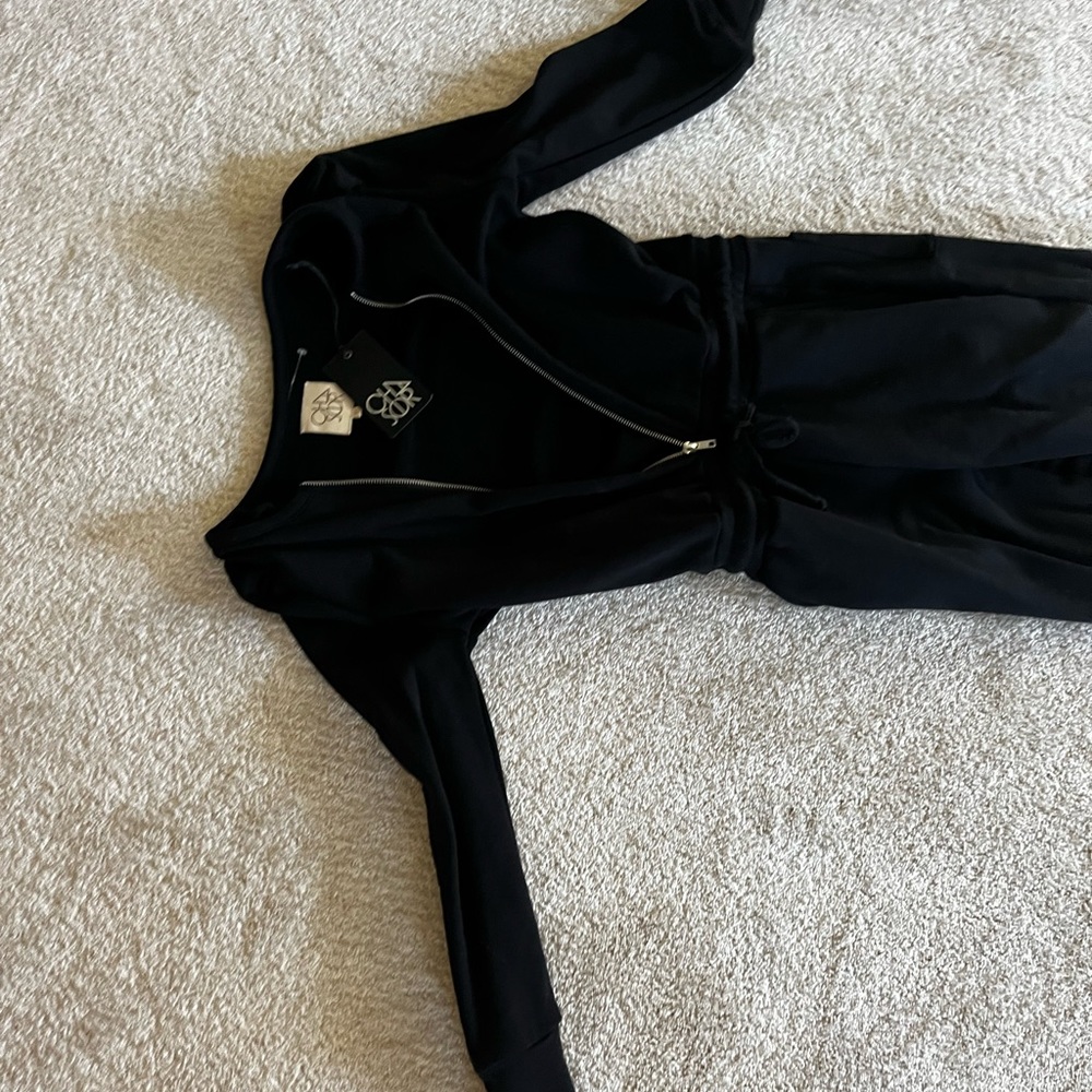 Chaser Ruffled Shoulder One Piece Jumpsuit